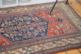 Antique hand-knotted Persian Bijar rug with intricate Herati motif in navy, madder red, and ivory.