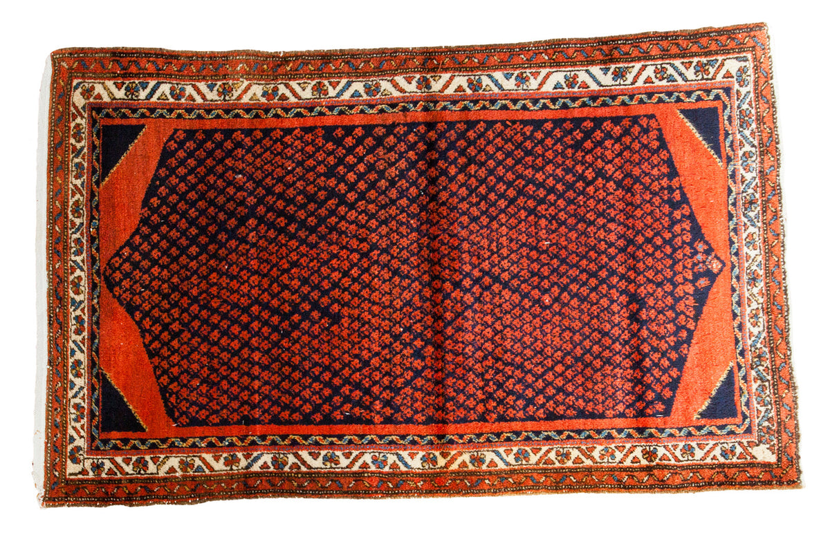 Vintage Northwest Persian rug, rich navy field and repeating rust red boteh, 3'10" x 6'2".