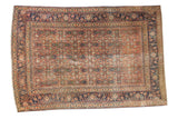 Antique Persian Tabriz rug with an allover herati motif in distressed rust and navy.