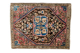 Antique Farahan Sarouk rug mat with a floral medallion in dusty plum, charcoal, and blue, measuring 1'11