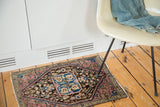 Antique Farahan Sarouk rug mat with a central medallion in a room setting, size 1'11