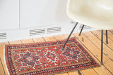 Vintage Karaja rug mat showing classic triple star medallions and varied geometric borders.
