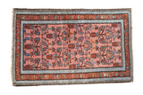 Vintage Persian Malayer rug with dusty rose allover floral bouquet and sky blue, madder red borders.