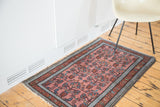 Vintage Persian Malayer rug, dusty rose floral field and sky blue running T border.