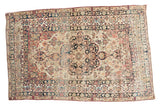 Antique Lavar Kerman rug with oversized medallion, unique floral border, beige, navy, cochineal red, 4'2