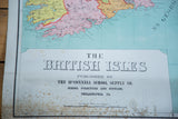 Detail view of antique British Isles map, McConnell Supply Co. text and bottom discoloration.