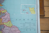 Vintage British Isles map detail showcasing vibrant colors, Channel Islands, and explanation text.