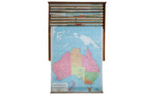Antique McConnell school pull down map of Australia with vibrant colors and bottom discoloration.