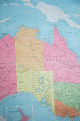 Vibrant pink, green, and blue geographic details of Victoria, New South Wales, and New Zealand.