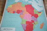 Vintage Africa pull down map with vibrant North African countries and bold typography.