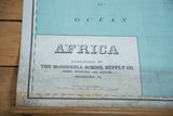 Early 20th century McConnell Africa map, showing title, publisher details, and aged paper.