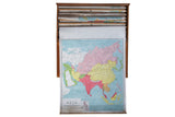 Antique pull down map of Asia with vibrant pastel colors, typography, and bottom discoloration.