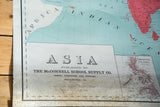 Publisher details on the vintage Asia map, showing lower discoloration and teal sea.