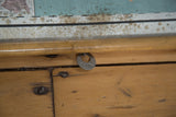 Vintage Asia pull down map's wooden dowel, inscribed metal ring, and discolored edge.