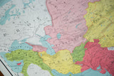 Detailed view of vintage map showing Persia, Afghanistan, and Baluchistan with vibrant colors.