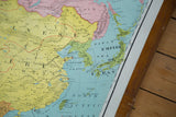 Lower right section of vintage Asia pull down map, showing Japan and bottom edge discoloration.