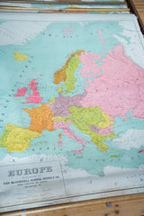 Vintage Europe map title and McConnell publisher text with bottom edge discoloration.