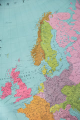 Vibrant colors and typography on the antique map showing British Isles and Scandinavia.