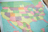 Antique circa 1900 pull down map showing colorful western and central USA states.