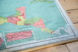 Antique pull-down map showing Central America, Puerto Rico, and bottom edge discoloration.