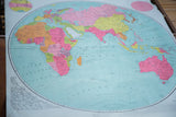 Vibrant pink, green, and blue landmasses of Africa on the vintage Eastern Hemisphere map.