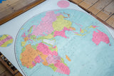 Vibrant pastel colors and clear typography on a section of the vintage Eastern Hemisphere world map.