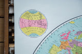 Vibrant colors and detailed typography on antique Eastern Hemisphere map, showing Europe.