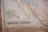 Antique pull down map: Baja California, Mexico, muted pastel regions, and strong bottom discoloration.