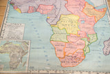 Central-eastern Africa on vintage classroom map, showing pastel countries and striped territories.