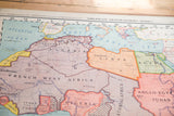 Vintage map detail of Central Africa featuring pastel orange, green, and brown tones.
