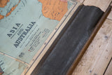 Late 1930s map's bottom wood dowel, stitched canvas, and discolored edge.