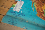 Heavy creasing and discoloration on the bottom of the Mid-Century North America map.