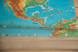 Vibrant mid-century typography and heavy creasing on Central America pull-down map.