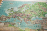 Vintage Nystrom map section of Central, Eastern Europe, with subdued blues and greens.