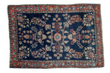 Antique Farahan Mohajeran Sarouk rug, dark blue field, intricate floral motifs, blush rose palmette border, 3'4