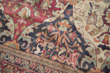 Historic darning and reweaves showing the character of an antique Lavar Kerman collector carpet.