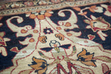 Germinating planter motif with rare part-silk highlights on an antique Lavar Kerman carpet.