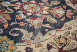 Finely woven detail of a late 19th-century Kerman showing the time-softened pile and floral forms.