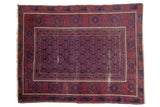 Bold vintage hand-knotted Belouch rug with allover navy geometric floral field, brick red border, and localized wear, 3'8