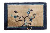 Antique hand-knotted Peking mat: beige field, cobalt blue border, blossoming florals, butterflies, 1'9