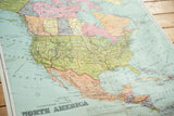 Western regions of 1916 W & AK Johnston North America map with pastel colors.