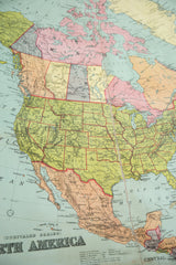 Antique W & AK Johnston map detail: pastel green USA, soft pink Canada, tan Mexico.