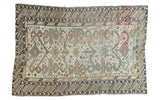 Distressed antique Caucasian rug with bold geometric ram's horn and Perpedil motifs on an ivory field, 3'10