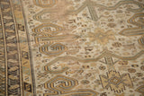 Distressed antique Caucasian rug with visible ram's horn and Holbein design motifs.