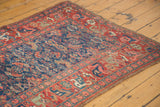 Antique Kurdish Bidjar rug corner, madder red border, playful arabesque motifs, indigo herati field.