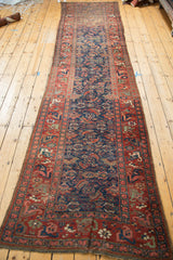 Close-up of antique Kurdish Bidjar runner's madder red border with gerus style arabesques.
