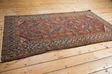 Antique Northwest Persian rug geometric border in indigo, burgundy, and saffron with new selvage.