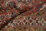 Antique Northwest Persian rug border detail with geometric stars, rich indigo and madder red.