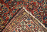 New brown selvage and natural fringe on antique Northwest Persian rug corner detail.