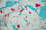 Vintage map segment showing Bedford, Mt. Kisco, blue water, and red zones.